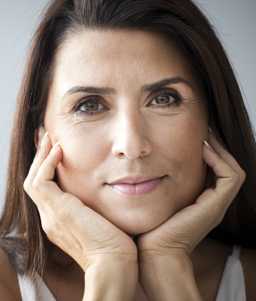 Photo of a middle-age woman with aging skin